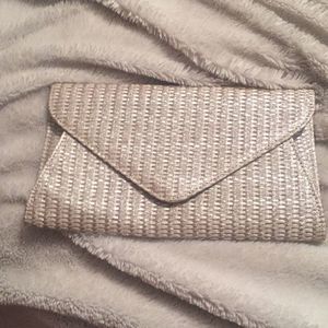 Silver woven clutch